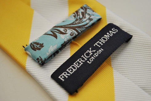 yellow and white barber striped tie